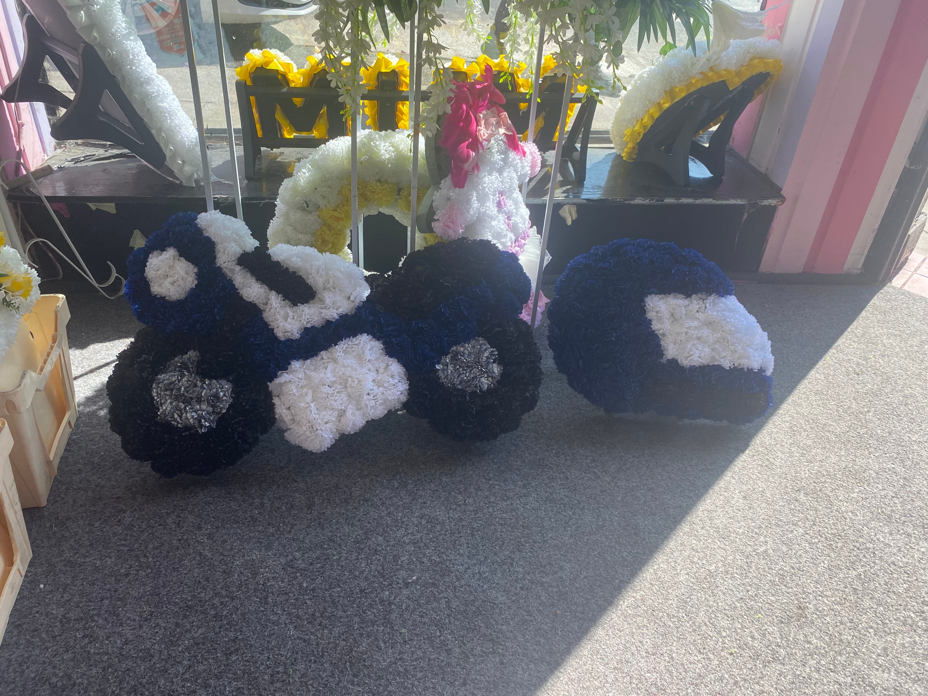 Flower pom pom tribute display