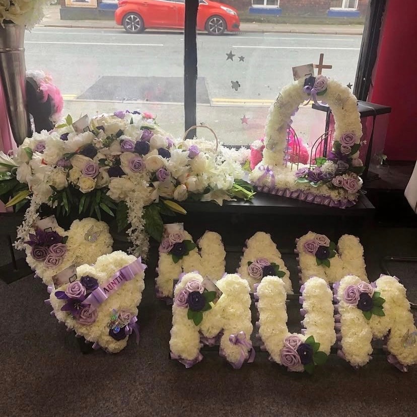Floral funeral tribute display